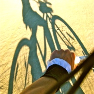 Chasquita's shadow cycling across the playa.