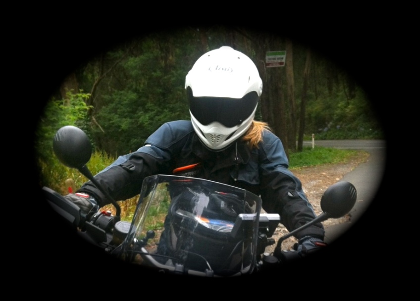 Chasquita on a motorbike.